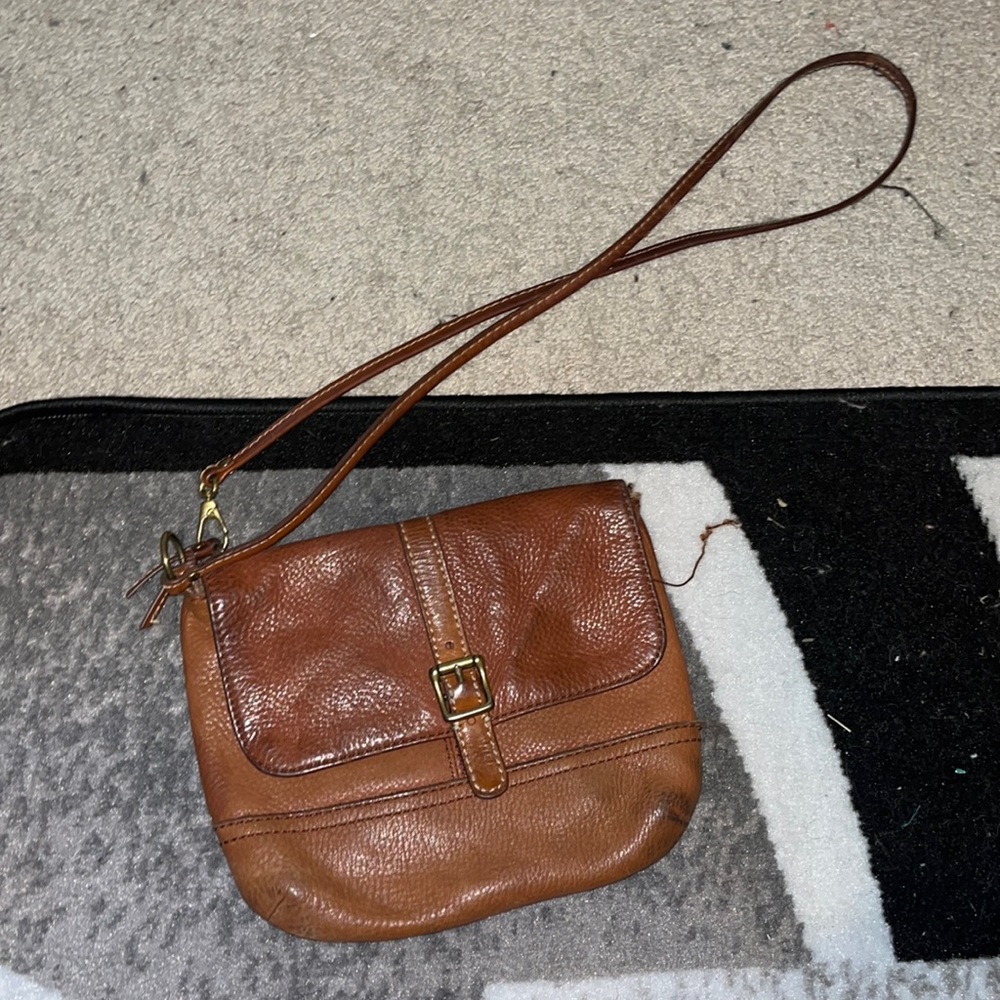 Never worn. But has tears. Sure this was a gift. No use for it